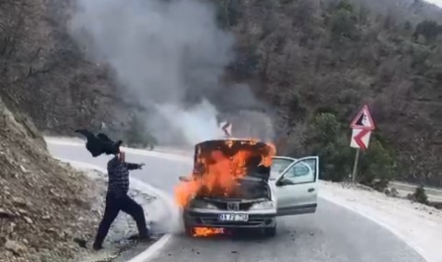 Ceketle söndürmeye çalıştı!;